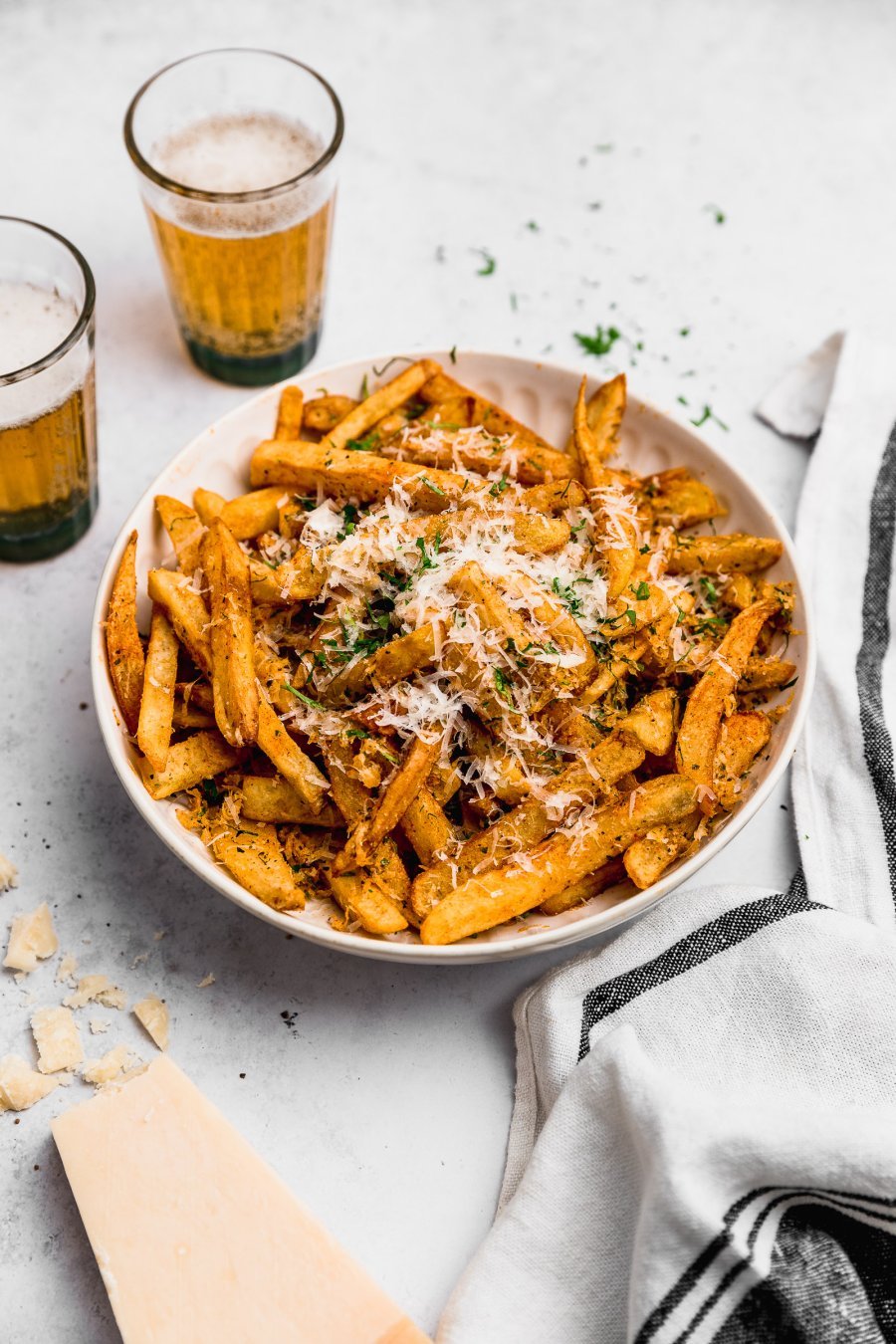 papas fritas con parmesano